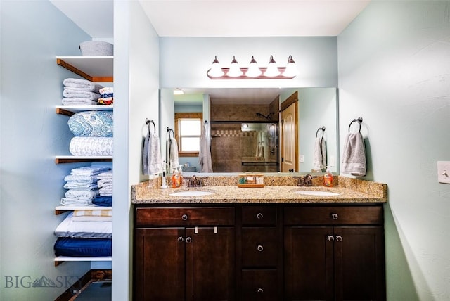 1602 Ingomar Blvd, Belgrade, MT 59714 - bathroom with a stall shower, double vanity, and baseboards