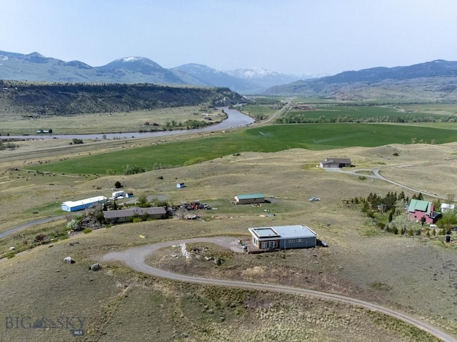 view of mountain backdrop featuring rural landscape