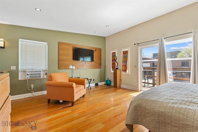 bedroom with baseboards, light wood-style floors, recessed lighting, access to outside, and cooling unit