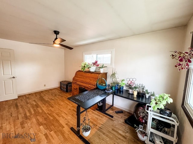607 Meadowlark Ln, Livingston, MT 59047 - office area featuring wood finished floors, ceiling fan, and baseboards