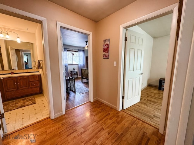 607 Meadowlark Ln, Livingston, MT 59047 - corridor with light wood-type flooring and baseboards