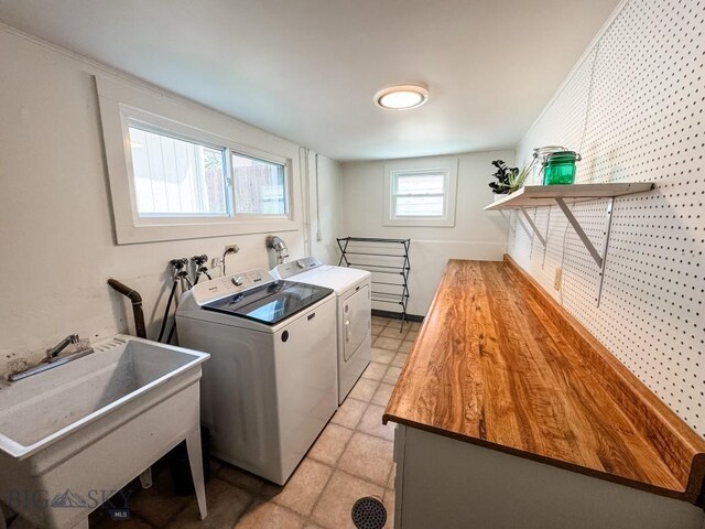 607 Meadowlark Ln, Livingston, MT 59047 - washroom featuring independent washer and dryer and light floors