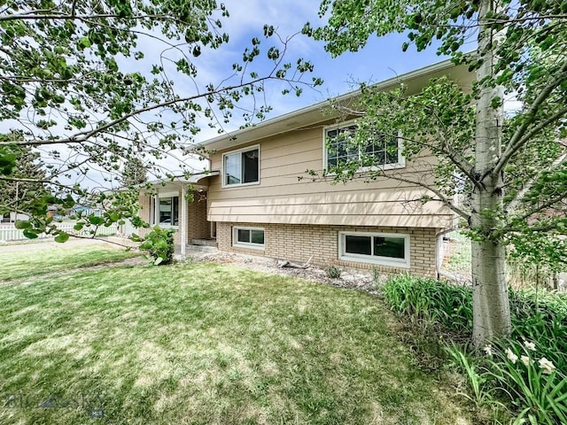 607 Meadowlark Ln, Livingston, MT 59047 - back of property featuring a lawn