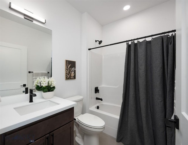 full bathroom with toilet, vanity, shower / bath combo with shower curtain, and recessed lighting