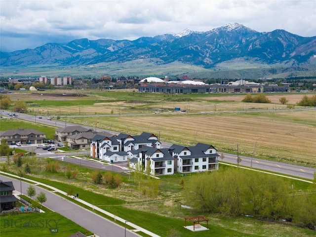 aerial view of residential area with a mountainous background
