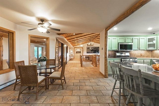 dining room featuring lofted ceiling, ceiling fan, recessed lighting, a chandelier, and stone tile flooring