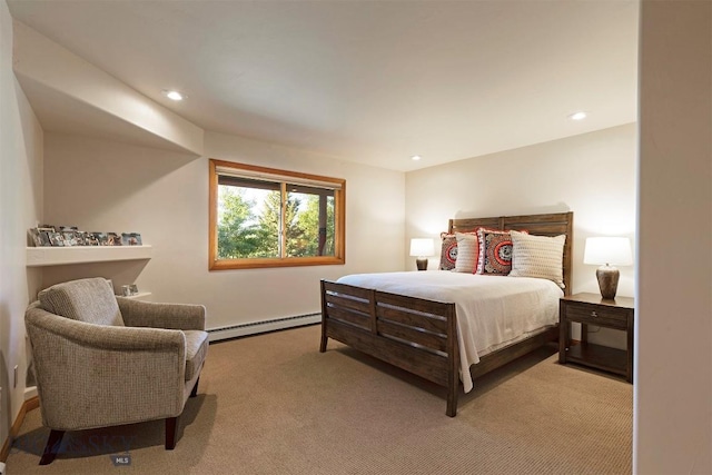 carpeted bedroom with a baseboard radiator and recessed lighting