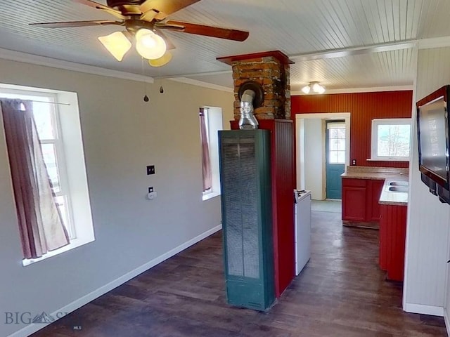 401 E 2nd Ave, Big Timber, MT 59011 - kitchen with a heating unit, ceiling fan, dark wood-type flooring, crown molding, and baseboards