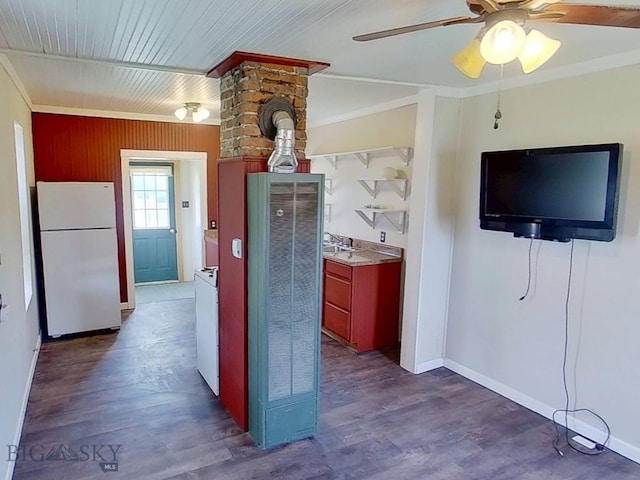 401 E 2nd Ave, Big Timber, MT 59011 - corridor with ornamental molding, baseboards, a heating unit, and dark wood-style flooring