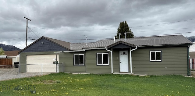 1820 Utah, Butte, MT 59701 - ranch-style house with gravel driveway, metal roof, and an attached garage