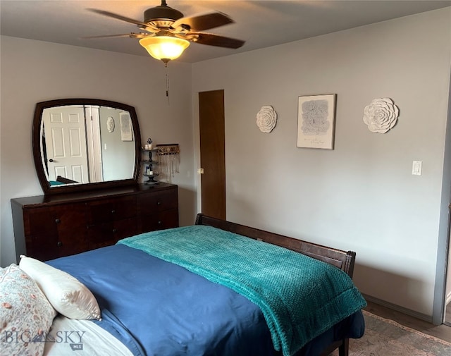 bedroom featuring ceiling fan