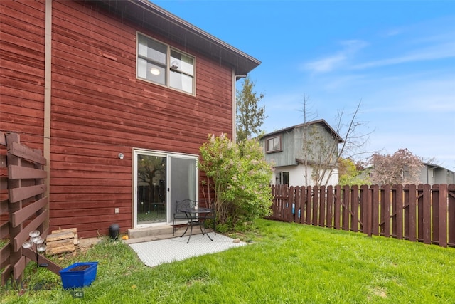 back of property featuring a patio