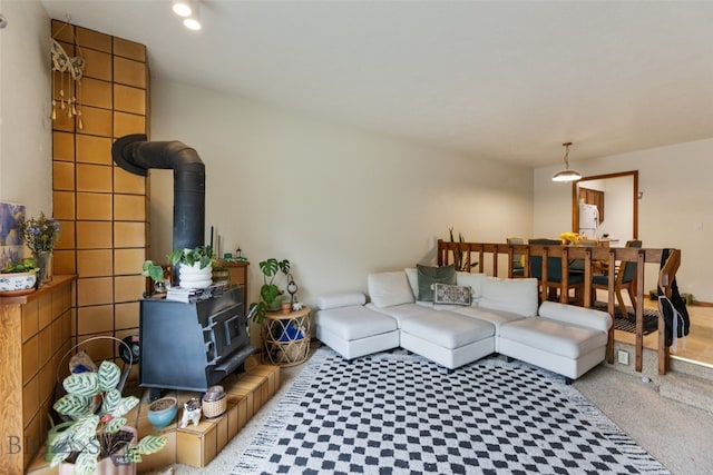 living room featuring a wood stove