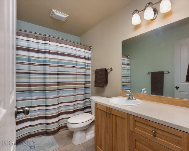 128 Droulliard Ave, Bozeman, MT 59718 - full bath with toilet, vanity, tile patterned flooring, and a shower with shower curtain