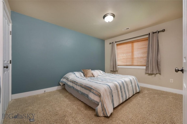 128 Droulliard Ave, Bozeman, MT 59718 - carpeted bedroom featuring baseboards