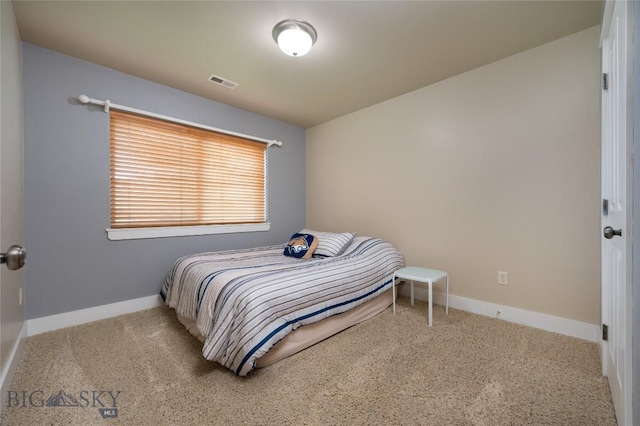 128 Droulliard Ave, Bozeman, MT 59718 - carpeted bedroom featuring baseboards