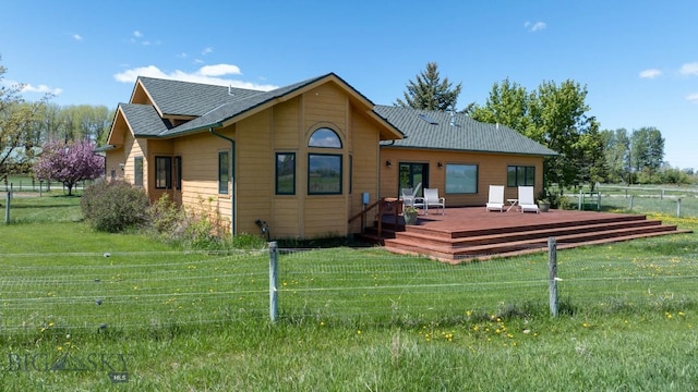 64 Shandalyn Ln, Bozeman, MT 59718 - back of property featuring a deck and roof with shingles