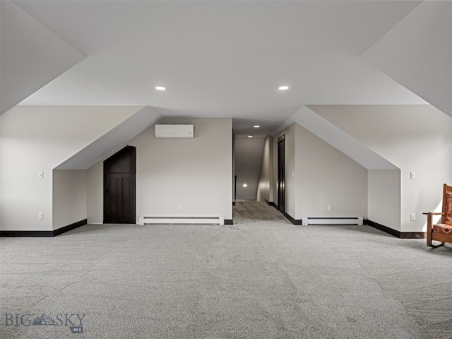 449 Minni Hall Rd, Bozeman, MT 59715 - additional living space featuring a baseboard heating unit, a wall unit AC, light colored carpet, recessed lighting, and baseboards