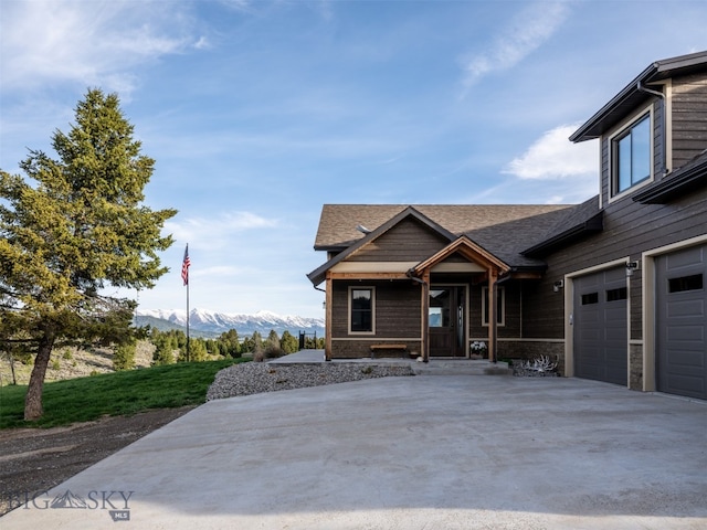449 Minni Hall Rd, Bozeman, MT 59715 - view of front facade with a mountain view and concrete driveway