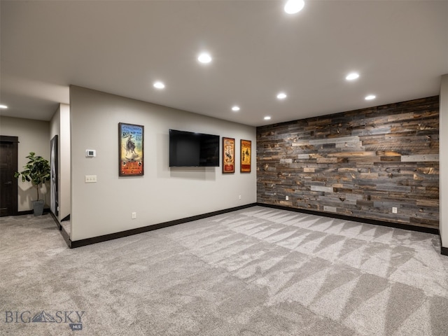 449 Minni Hall Rd, Bozeman, MT 59715 - spare room with carpet, recessed lighting, baseboards, and wooden walls