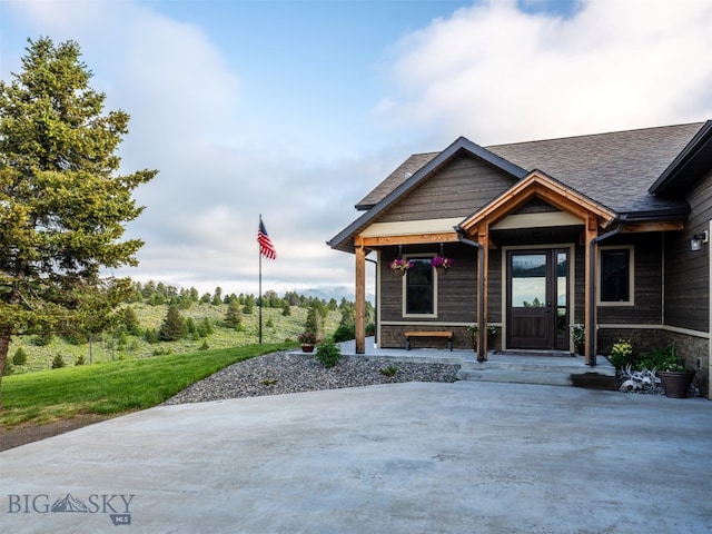 449 Minni Hall Rd, Bozeman, MT 59715 - view of front facade featuring covered porch and roof with shingles
