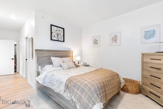 bedroom featuring wood finished floors