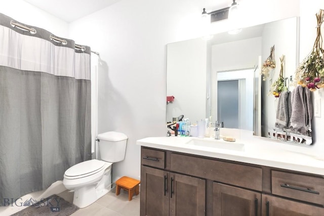 full bathroom with toilet, vanity, tile patterned floors, and a shower with curtain