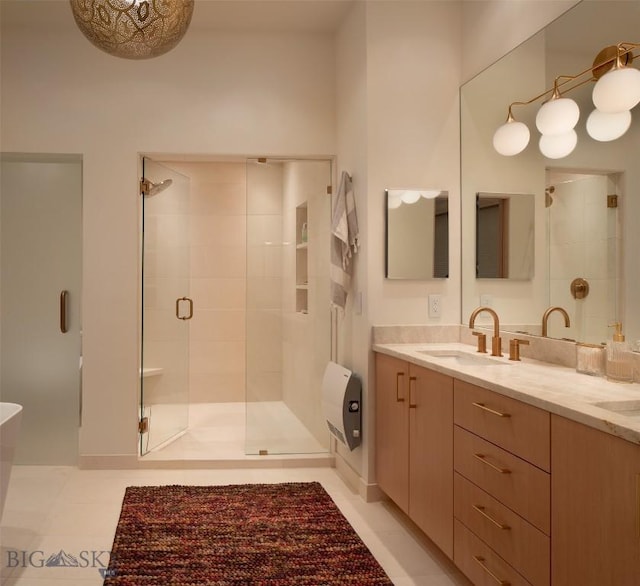 173 Spring Creek Hills Rd, Livingston, MT 59047 - full bathroom with a shower stall, double vanity, and a soaking tub