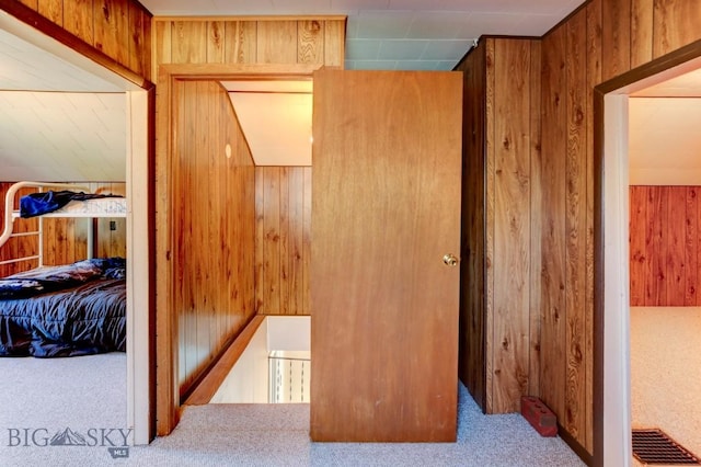 185 Elk Creek Rd N, Wilsall, MT 59086 - hall with carpet and wood walls
