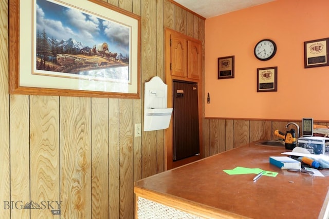 185 Elk Creek Rd N, Wilsall, MT 59086 - dining space with wooden walls and wainscoting