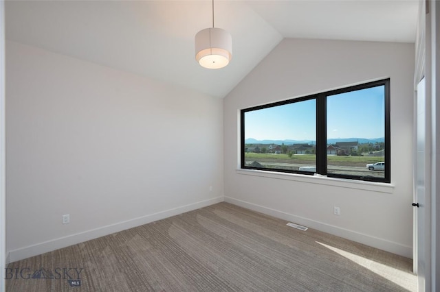 3030 Autumn Grove St Unit C, Bozeman, MT 59718 - carpeted spare room with vaulted ceiling and baseboards