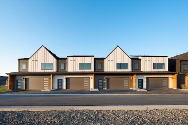 3030 Autumn Grove St Unit C, Bozeman, MT 59718 - multi unit property with board and batten siding and an attached garage
