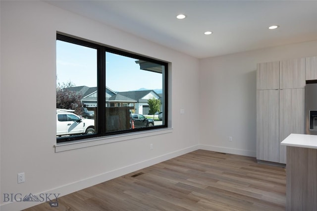3030 Autumn Grove St Unit C, Bozeman, MT 59718 - unfurnished dining area with recessed lighting, light wood-style flooring, and baseboards