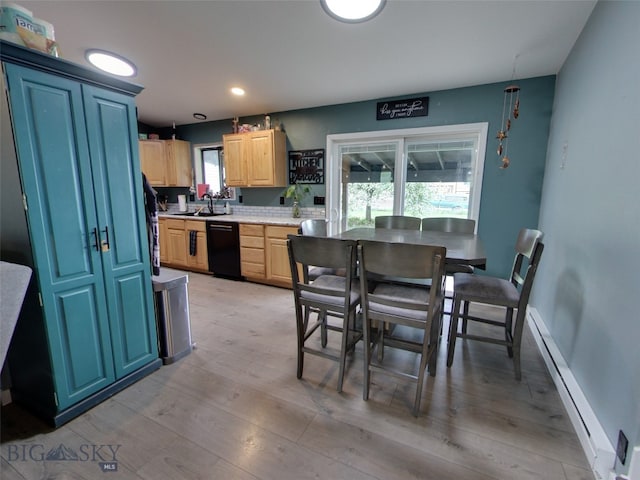 902 E Gallatin Ave, Belgrade, MT 59714 - dining space with a baseboard radiator, light wood finished floors, recessed lighting, and baseboards