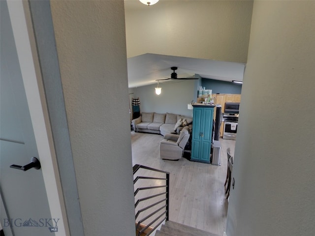 902 E Gallatin Ave, Belgrade, MT 59714 - living area with a ceiling fan, light wood-type flooring, and a textured wall