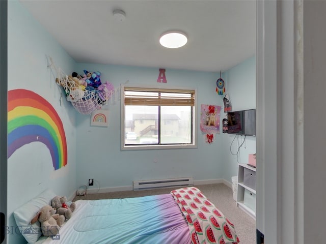 902 E Gallatin Ave, Belgrade, MT 59714 - bedroom with baseboard heating, carpet floors, and baseboards