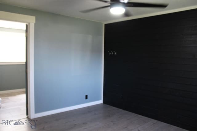 902 E Gallatin Ave, Belgrade, MT 59714 - unfurnished room featuring a ceiling fan and wood finished floors