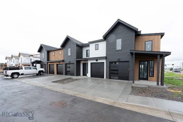 view of front of house featuring driveway and an attached garage