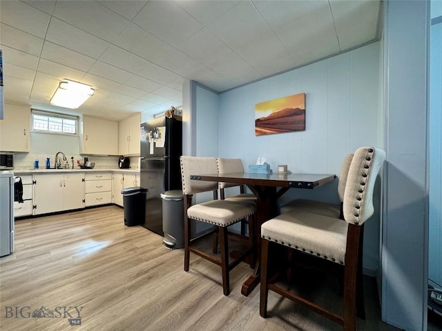 205 E Chinook St, Livingston, MT 59047 - dining space with light wood-style flooring