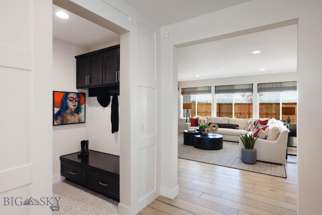 1210 Cody Dr, Belgrade, MT 59714 - corridor featuring baseboards, light wood-style flooring, and recessed lighting