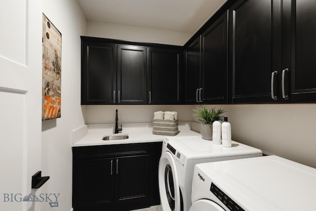 1210 Cody Dr, Belgrade, MT 59714 - clothes washing area featuring cabinet space and washer and clothes dryer