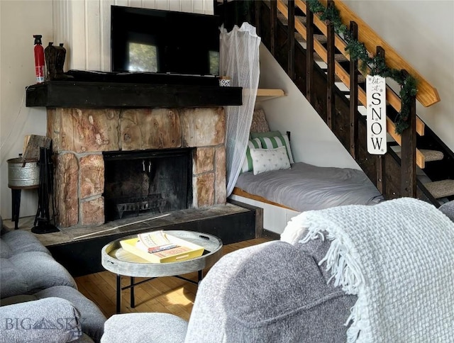 2575 Curley Bear Rd Unit 141, Big Sky, MT 59716 - living room with a fireplace and wood finished floors
