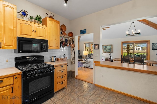 530 W Hulbert Rd, Bozeman, MT 59718 - kitchen featuring black appliances, tasteful backsplash, light countertops, a chandelier, and light tile patterned floors