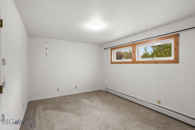 601 N C St, Livingston, MT 59047 - unfurnished room with baseboard heating, carpet, and baseboards