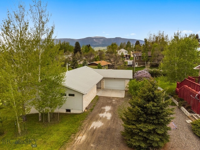 601 N C St, Livingston, MT 59047 - aerial view of property and surrounding area featuring a mountain backdrop