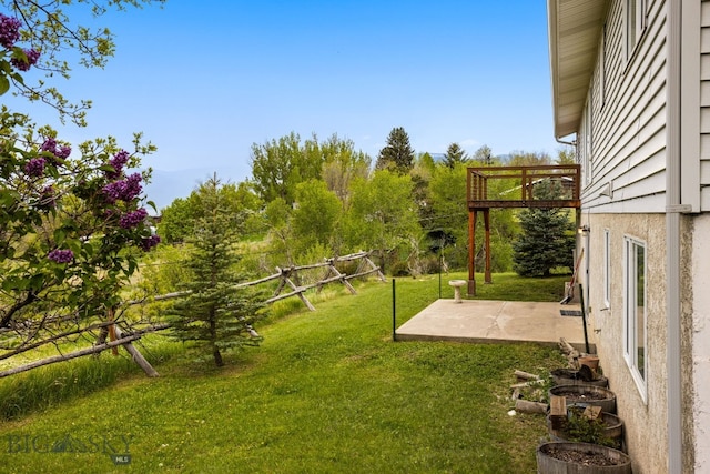 601 N C St, Livingston, MT 59047 - view of grassy yard featuring a patio area