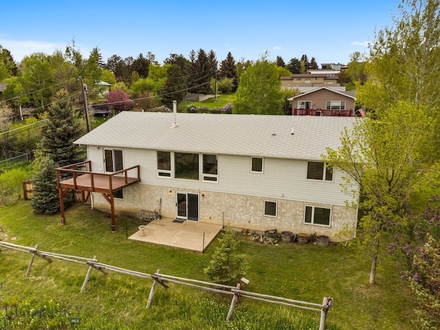 601 N C St, Livingston, MT 59047 - rear view of property featuring a patio area and a wooden deck