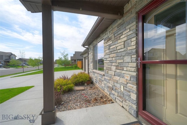 1510 Ingomar Blvd, Belgrade, MT 59714 - view of property exterior featuring stone siding