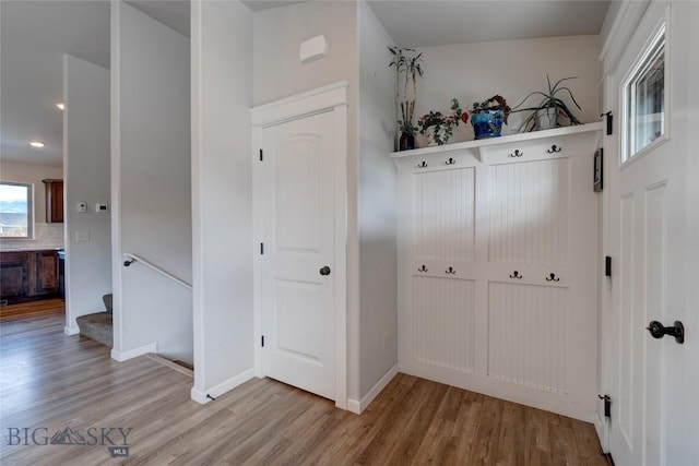 1510 Ingomar Blvd, Belgrade, MT 59714 - mudroom featuring wood finished floors, baseboards, and recessed lighting