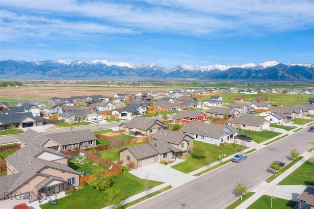 1510 Ingomar Blvd, Belgrade, MT 59714 - aerial perspective of suburban area with a mountain backdrop